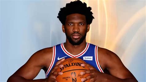 how tall is joel embiid in feet and inches
